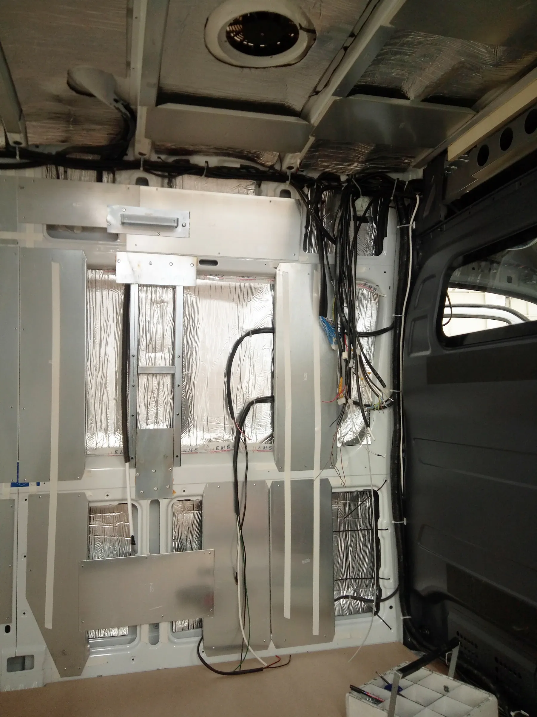 Insulation and wall frame in the patient compartment during assembly
