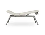 Examination couch EC with backrest and leg section raised