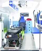 Patient compartment of the new-shape Hiace ambulance with stretcher on its platform