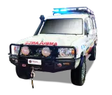 Toyota Land Cruiser ambulance, front view with roof lightbar and auxiliary driving lights