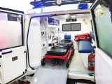 Toyota Land Cruiser ambulance with the rear doors open and the stretcher on its loading platform
